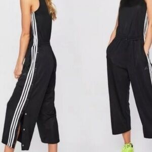 Adidas Black and White Track Pants with Iconic Stripes